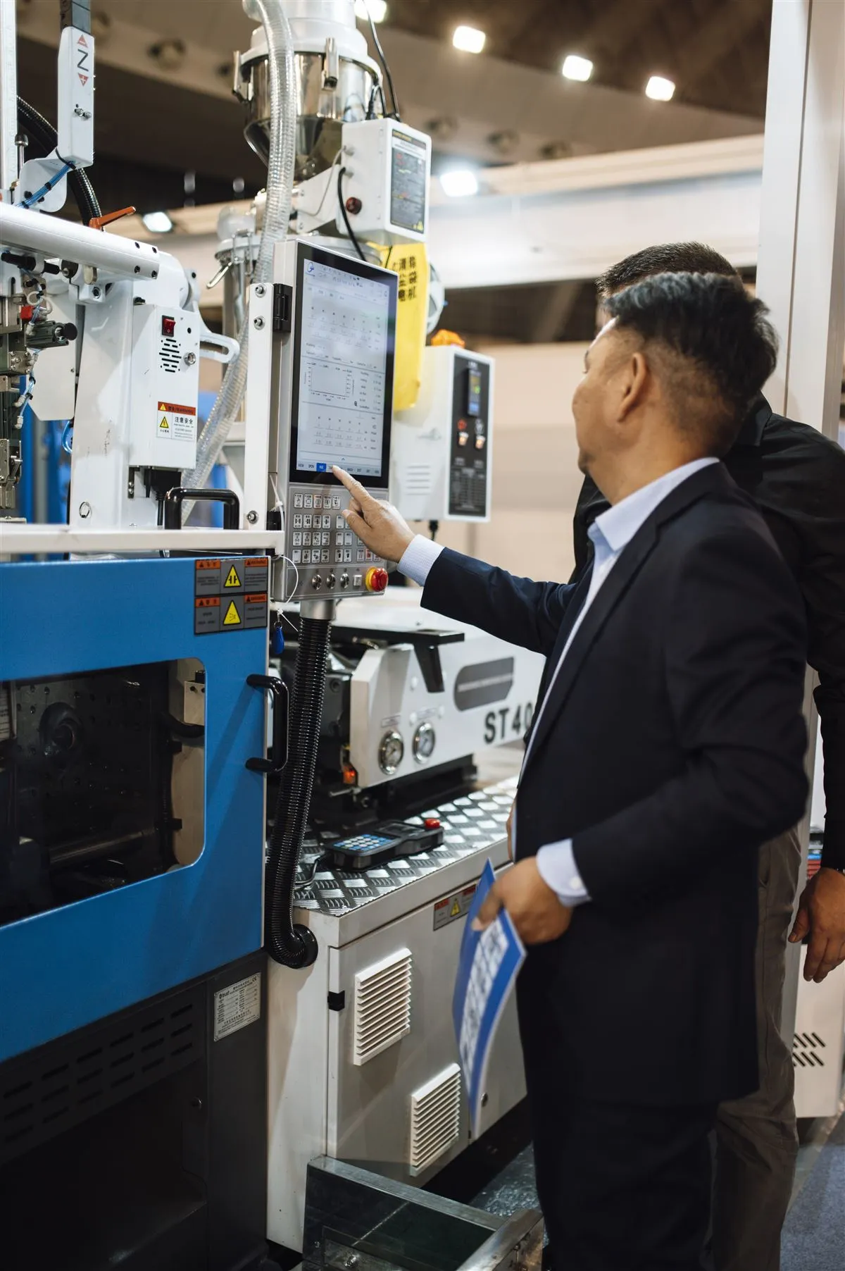 Operations professional inspecting equipment to keep orders on track